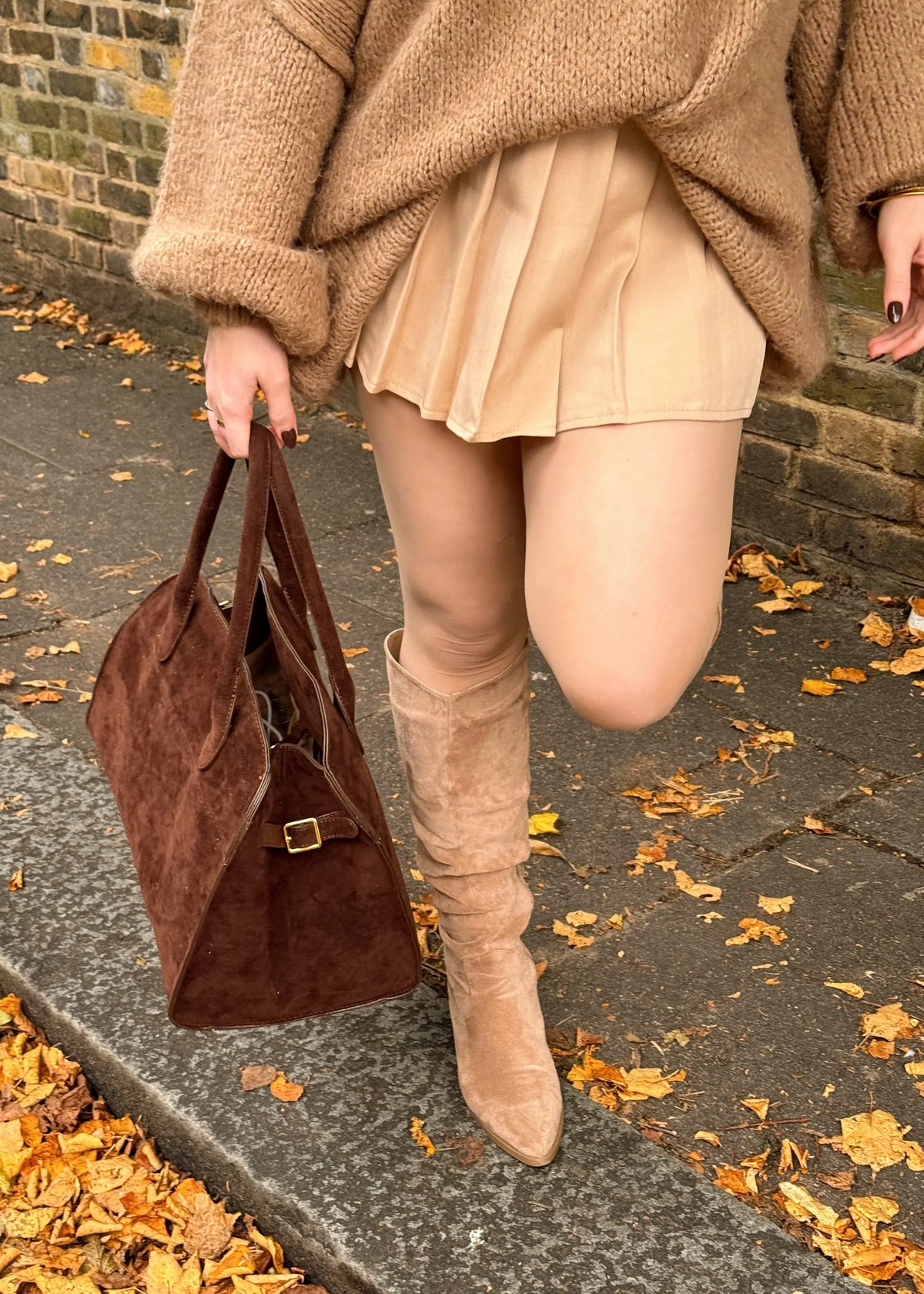 Designer-taske i læder