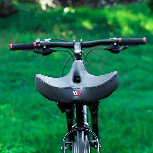 Ekstra bred ergonomisk cykelsadel med stødabsorberende polstring